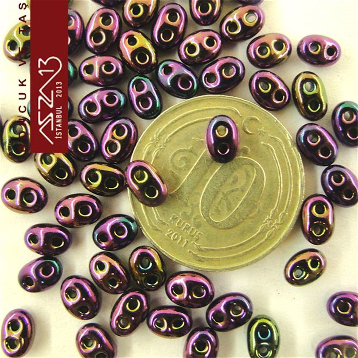 65 Adet 2,5x5 mm Metalik Janjanlı Mor Renkli Twin Cam Boncuk (3,8 gr)