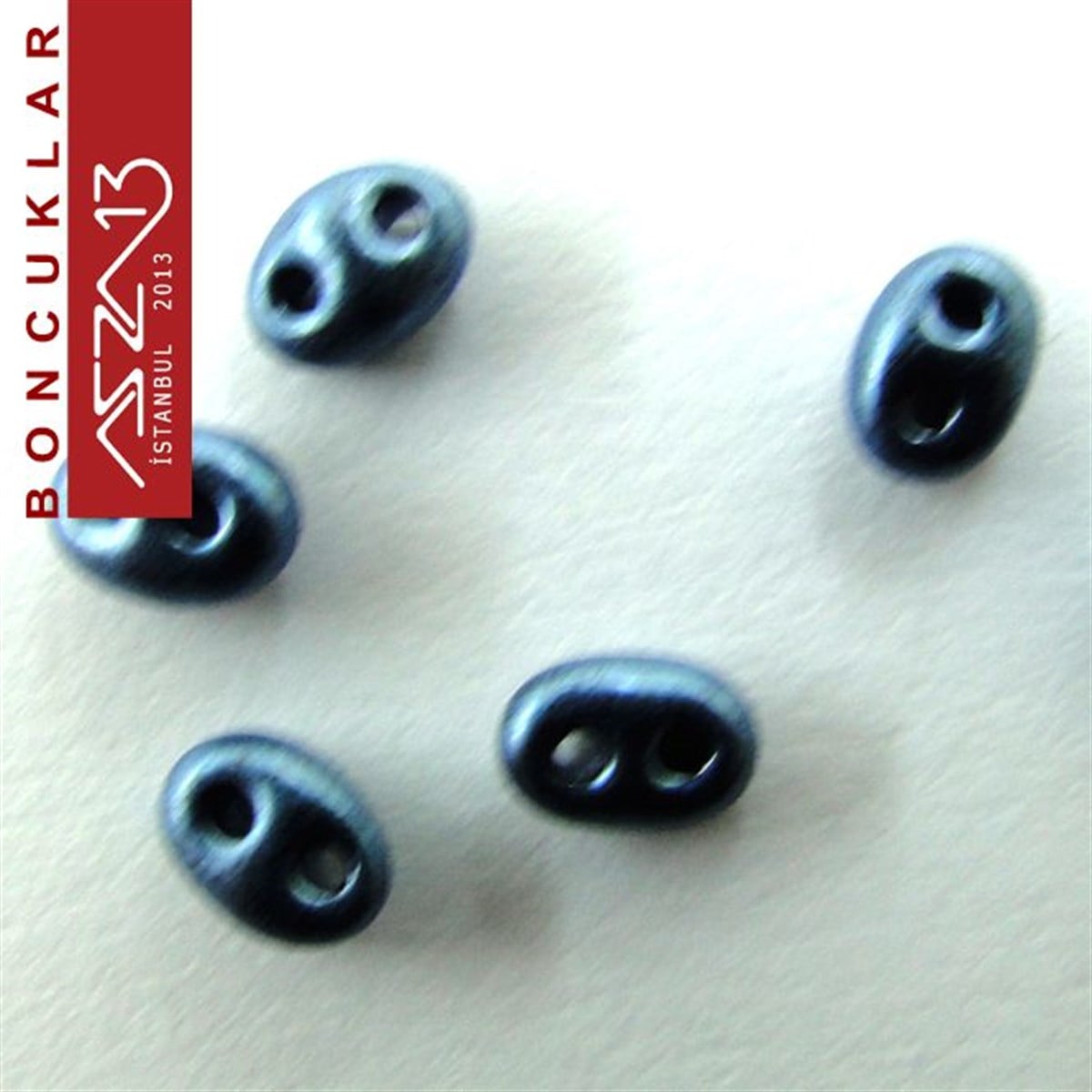 65 Adet 2,5x5 mm Metalik Petrol Mavisi Renkli Twin Cam Boncuk (3,8 gr)