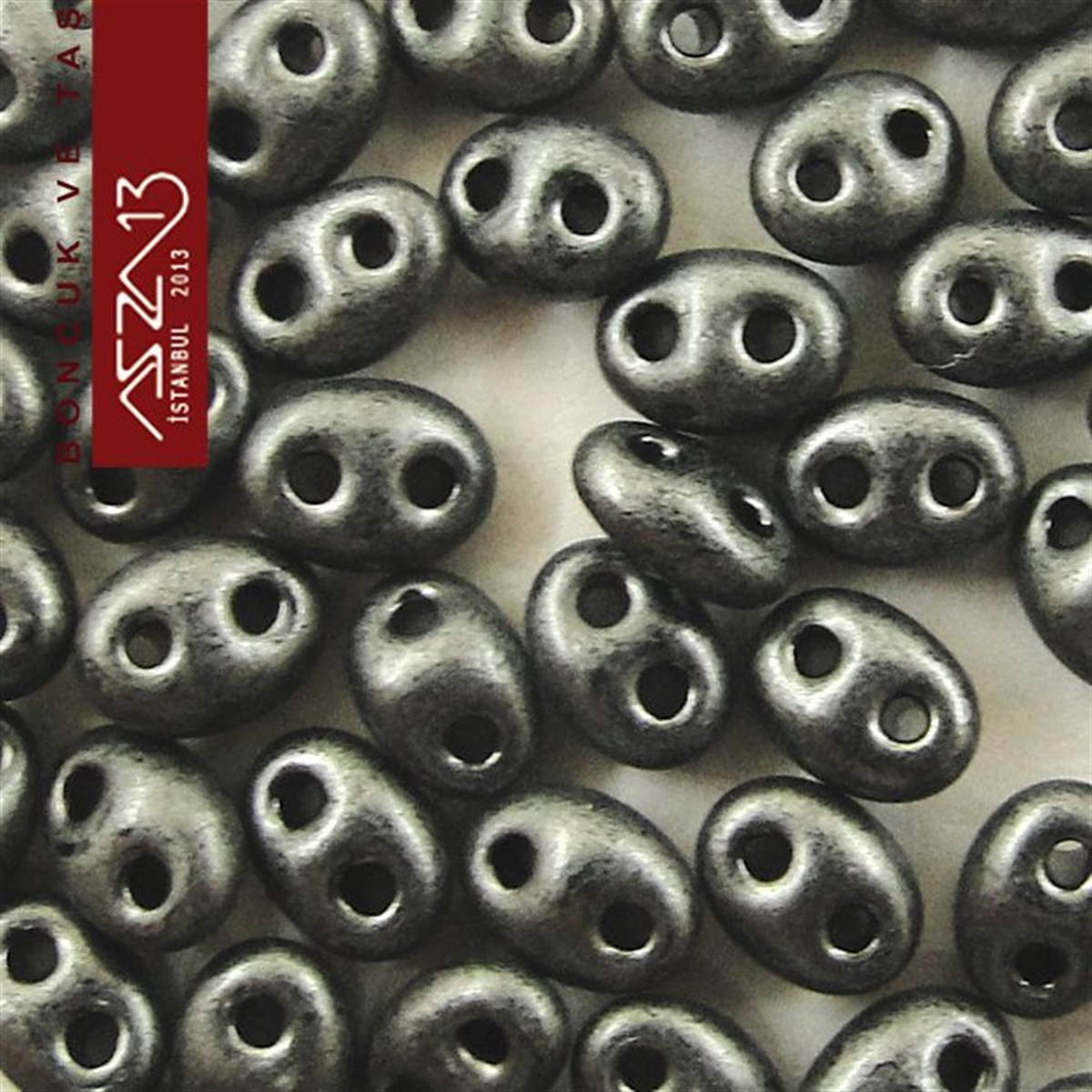 65 Adet 2,5x5 mm Metalik Gri Renkli Twin Cam Boncuk (3,8 gr)