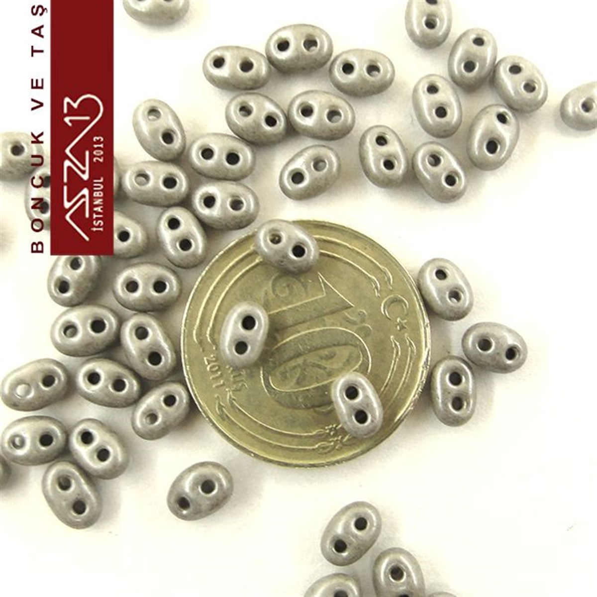 65 Adet 2,5x5 mm Koyu Gri Renkli Twin Cam Boncuk (3,8 gr)