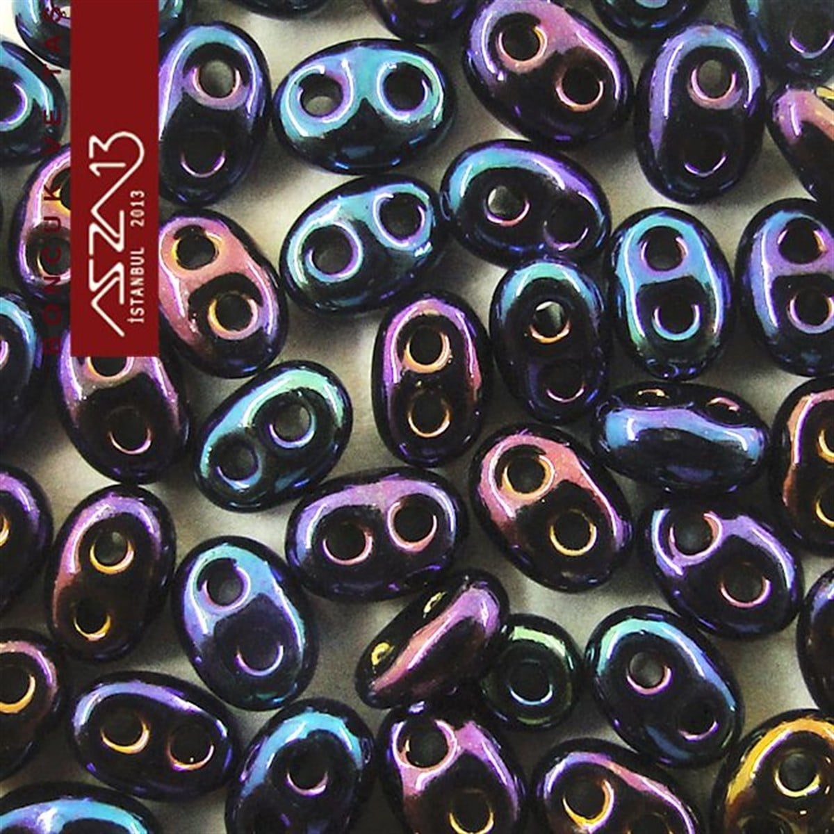 Cam Çift Delikli Twins BoncukBONCUK ve TAŞPreciosa65 Adet 2,5x5 mm Metalik Janjanlı Mavi-Mor Renkli Twin Cam Boncuk (3,8 gr)