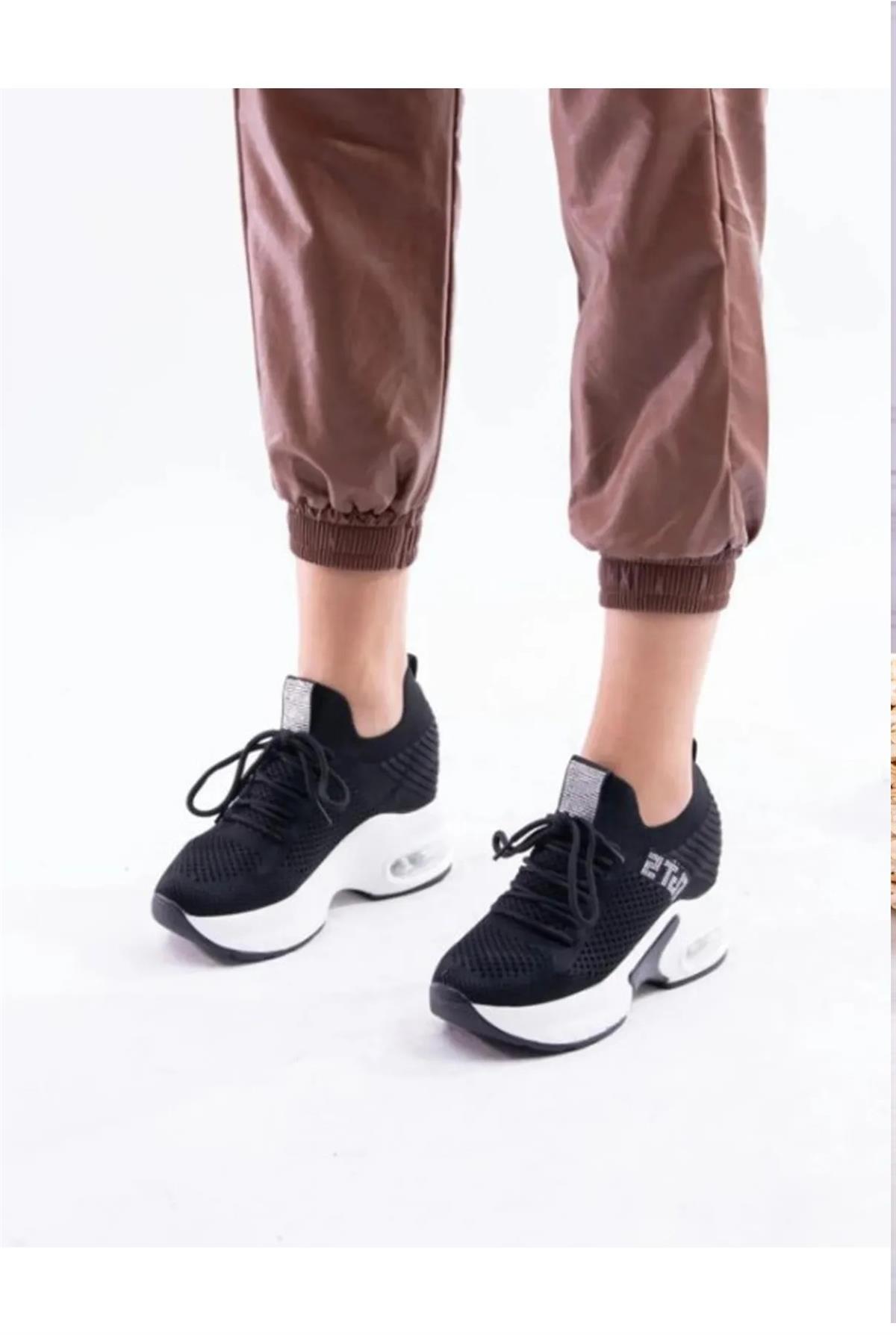 23Y300 YUKSEKDOLDU SPOR GUJA  Siyah