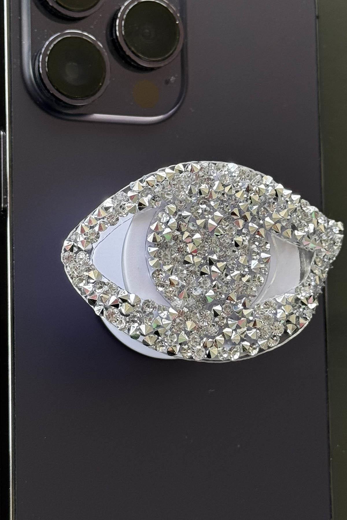 Gümüş Renk Taş Detaylı Göz Figürlü 3D Telefon Tutacağı