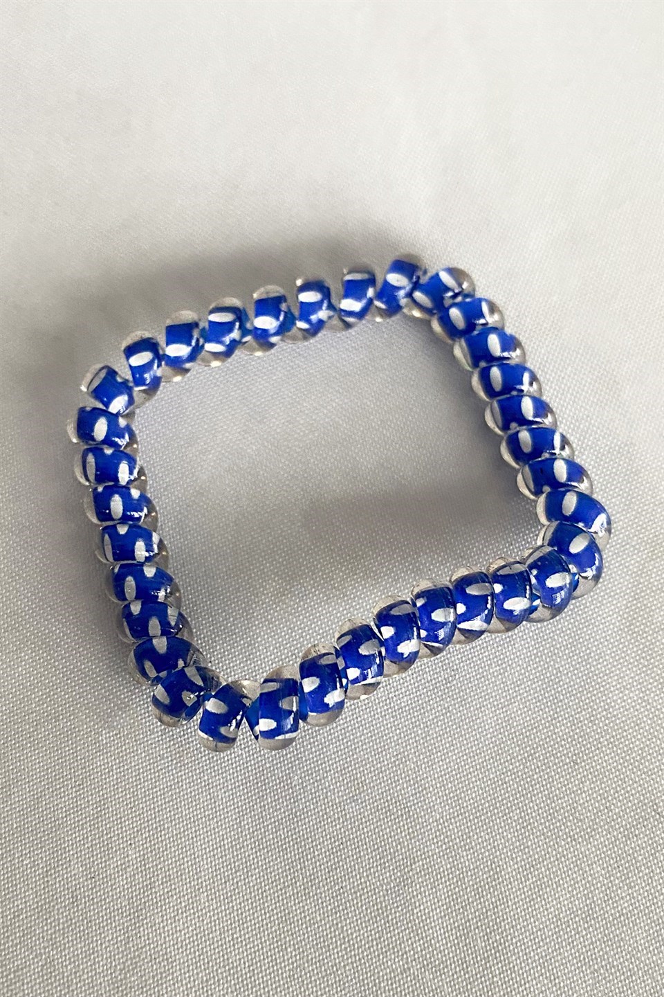 Mavi Renk Puantiyeli Helezon Lastik Toka