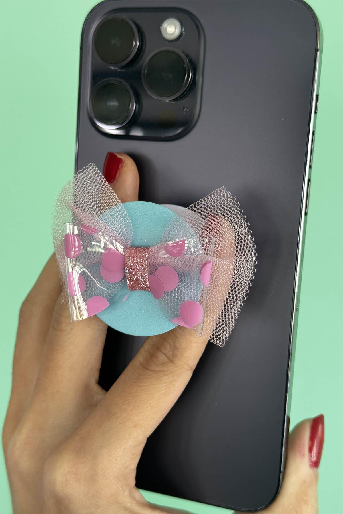 Mavi Ve Pembe Renk Kurdele Figürlü 3D Telefon Tutacağı
