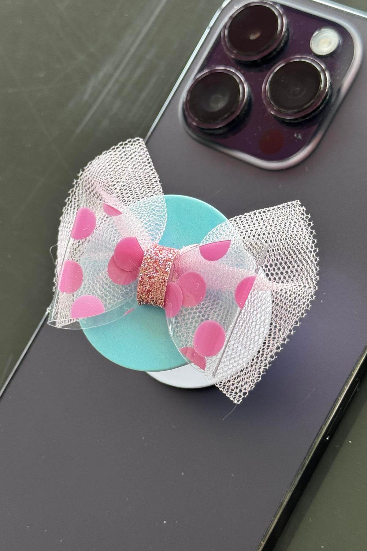 Mavi Ve Pembe Renk Kurdele Figürlü 3D Telefon Tutacağı