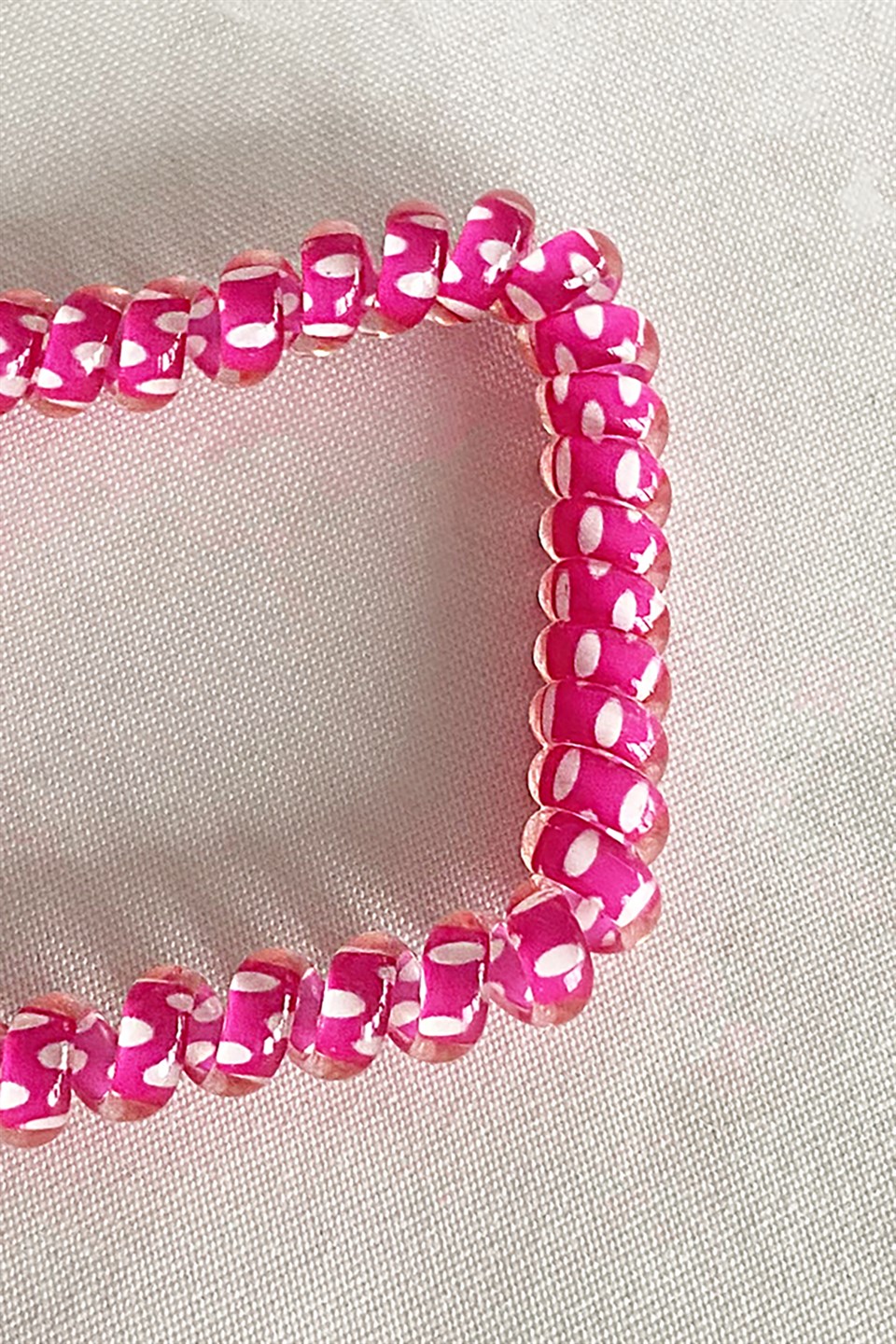 Pembe Renk Puantiyeli Helezon Lastik Toka