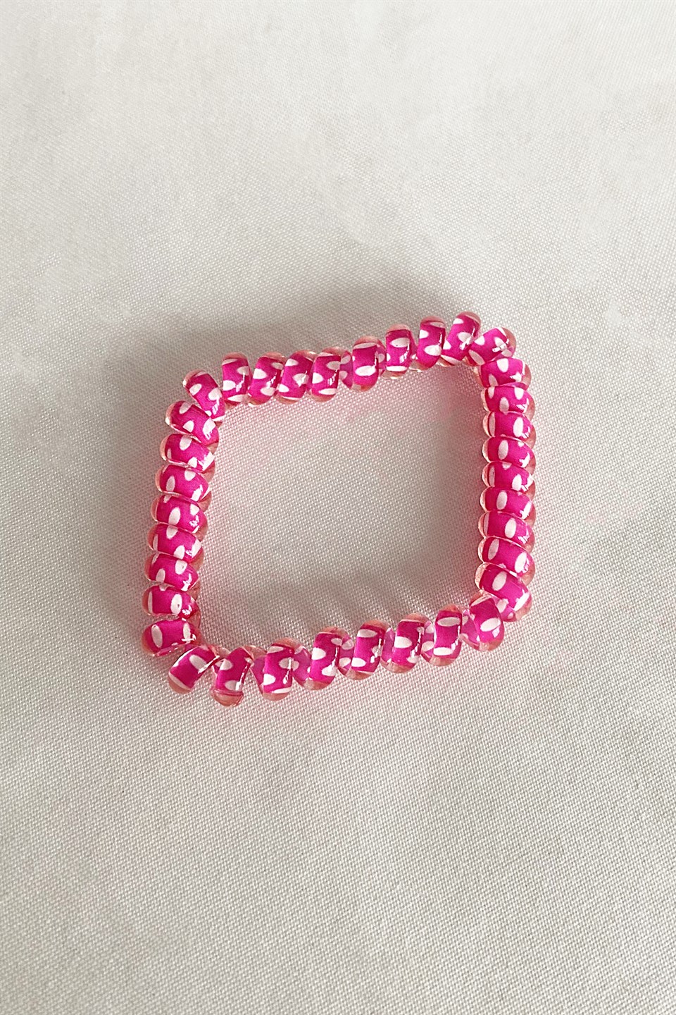 Pembe Renk Puantiyeli Helezon Lastik Toka