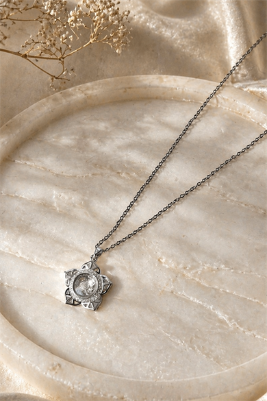 Gümüş Renk Çiçek Figürlü İçi Dönen Çelik Kolye