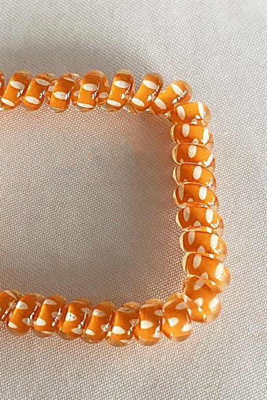 Turuncu Renk Puantiyeli Helezon Lastik Toka