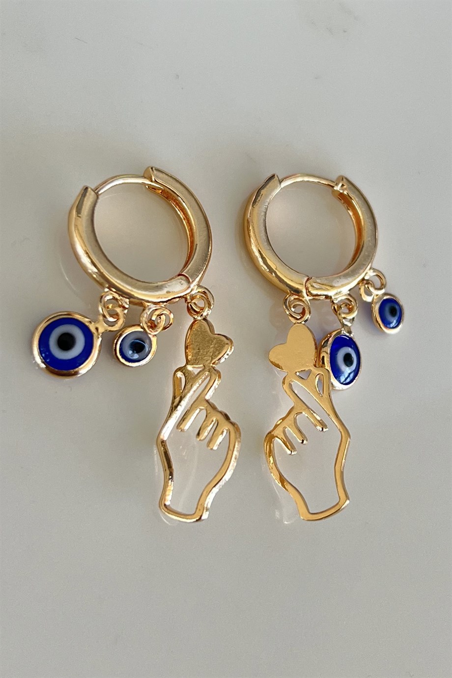 Takistir Jewelry | Golden color evil eye bead figured steel earrings  (double)
