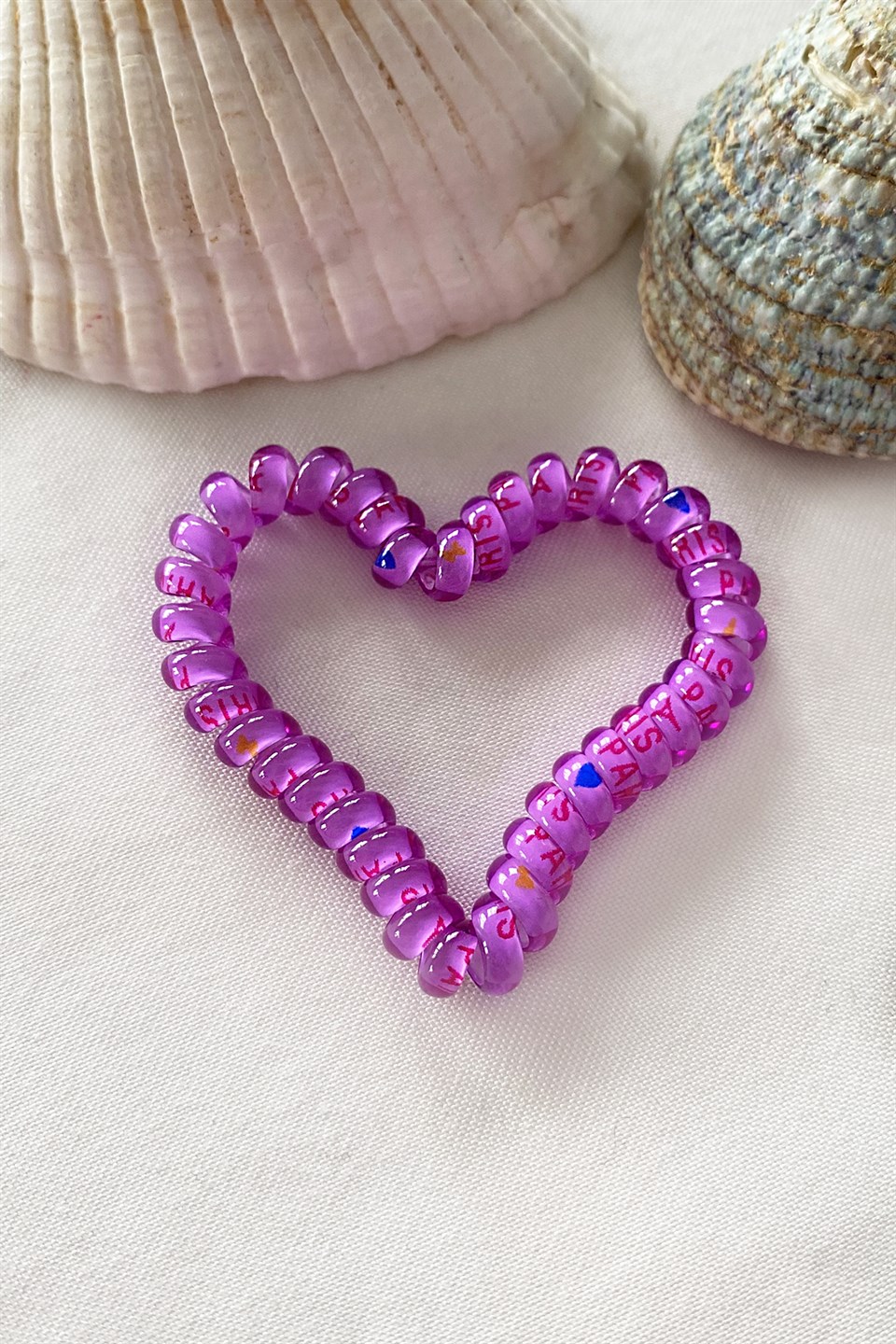 Mor Renk Kalpli Helezon Lastik Toka