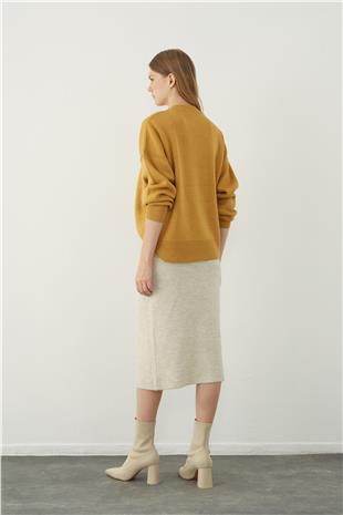 Asymmetrical slit midi knitted skirt