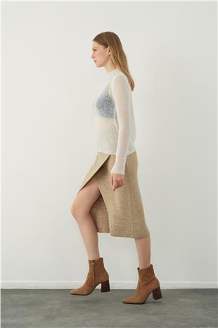 Asymmetrical slit midi knitted skirt