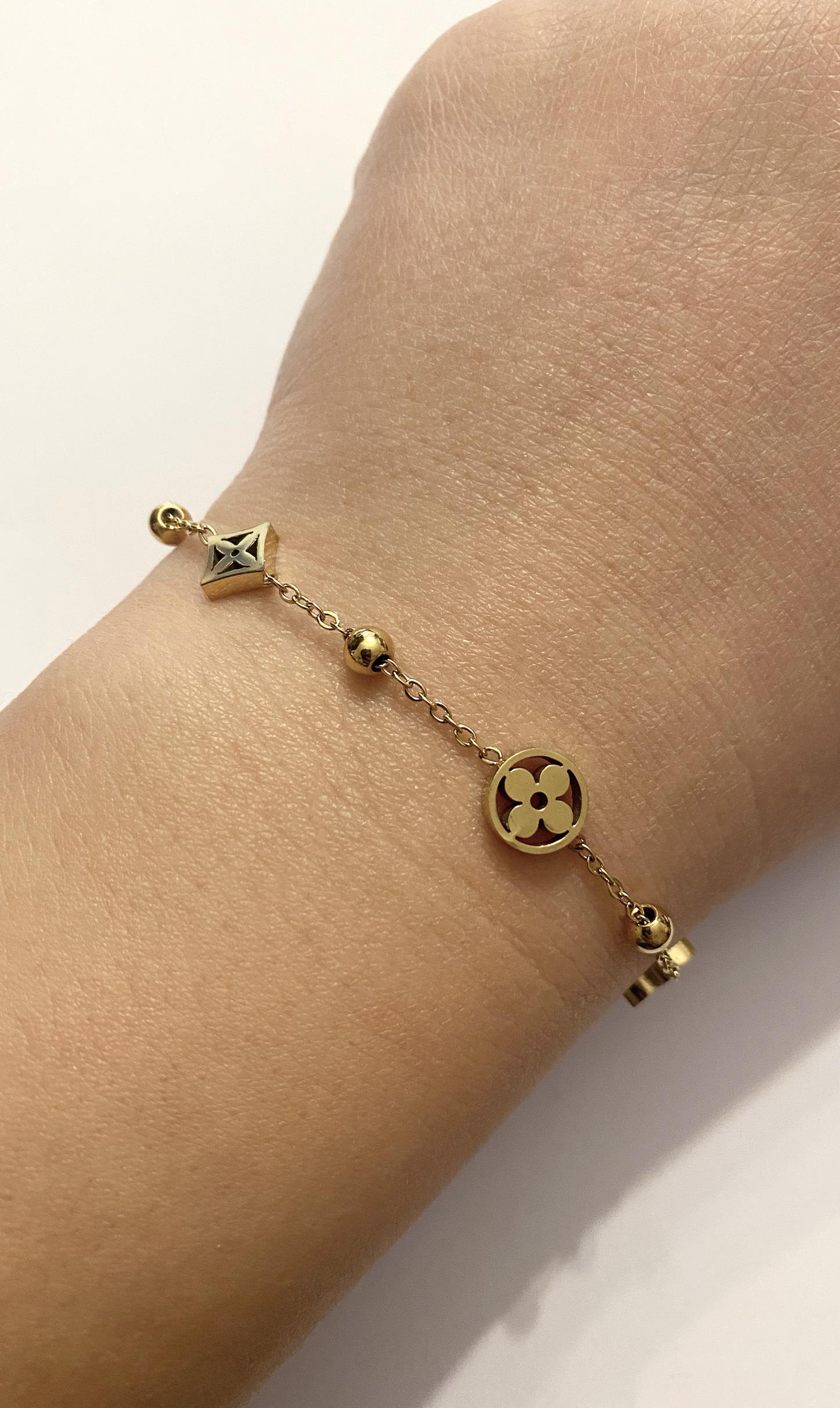 Kadın Çiçek ve Sembol Detay Çelik Bileklik