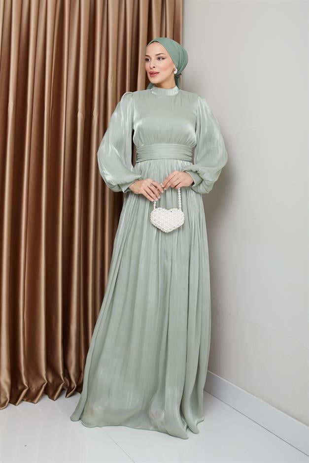 فستان سهرة حريري من يوريو للحجاب مع حزام خصر وتفاصيل مجمعة أخضر فاتح 1225