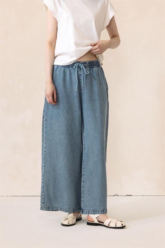 بنطلون جينز ناعم فضفاض بحزام خصر مطاطي أزرق 7576