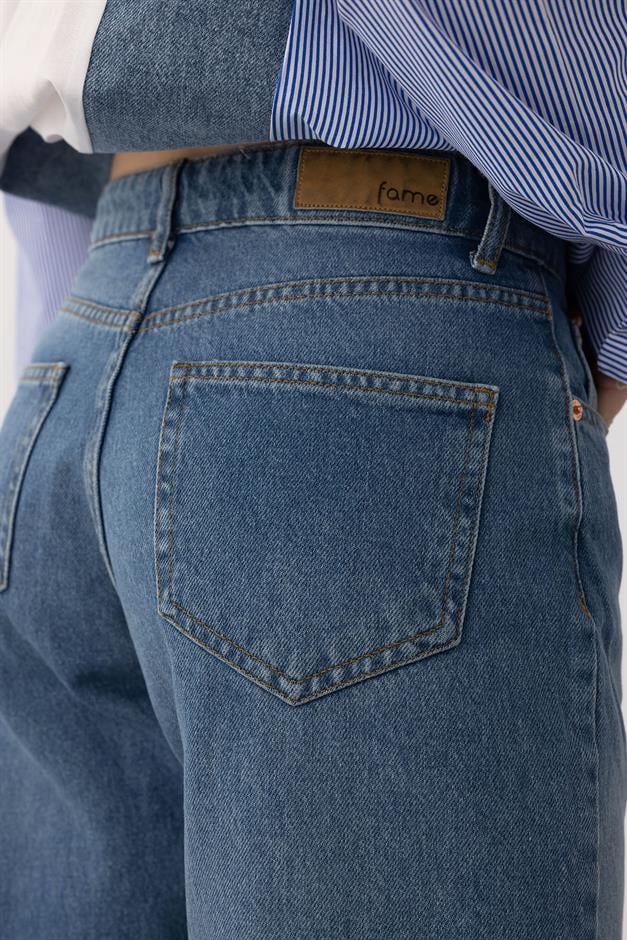 بنطال جينز واسع الساق بقصة مريحة وخصر منخفض أزرق 7570