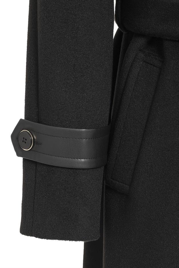 معطف طويل من الجلد بأكمام راجلان وكتف مفصل أسود 3084