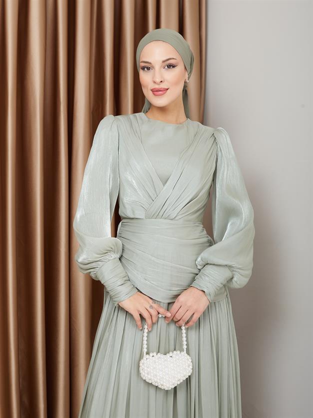 فستان سهرة شيفون كريستالي للحجاب مع تفاصيل الكشكشة والكسرات أخضر فاتح 1230