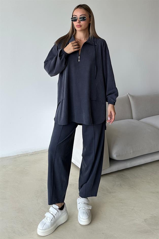 طقم تونيك وبنطلون من قماش محبوك فاخر مع تفاصيل سحاب على الياقة إنديجو 9375-TK