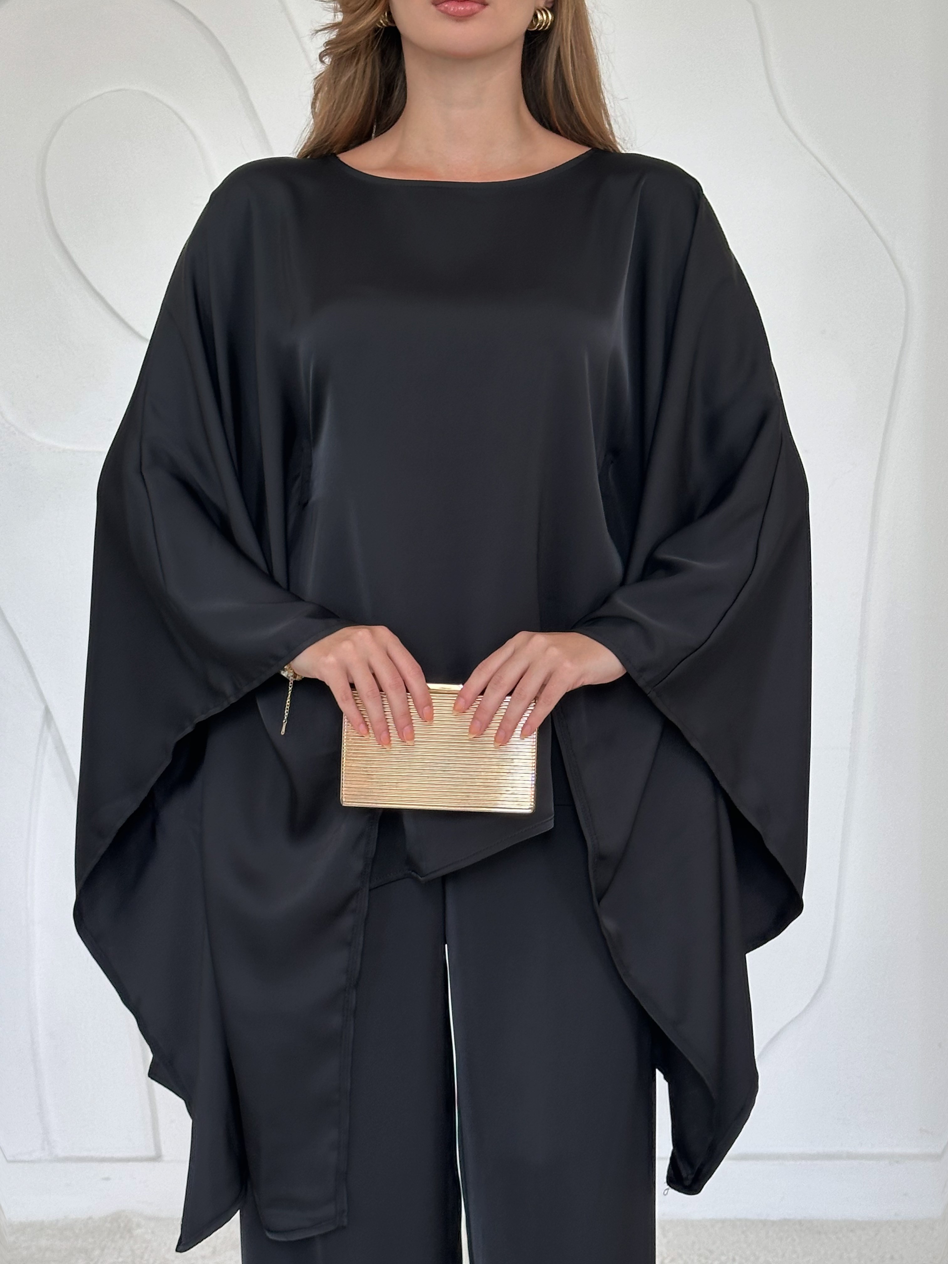 Siyah Pelerinli Takım