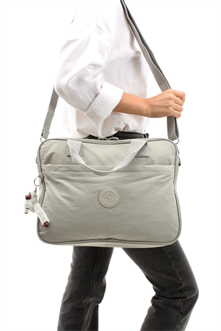 Sanmorris Unisex klinkır kumaş suya dayanıklı laptop bölmeli ayarlanabilir çapraz ve el askılı evrak ve laptop çantası farklı renk seçenekleriyle stoklarımızdadır.