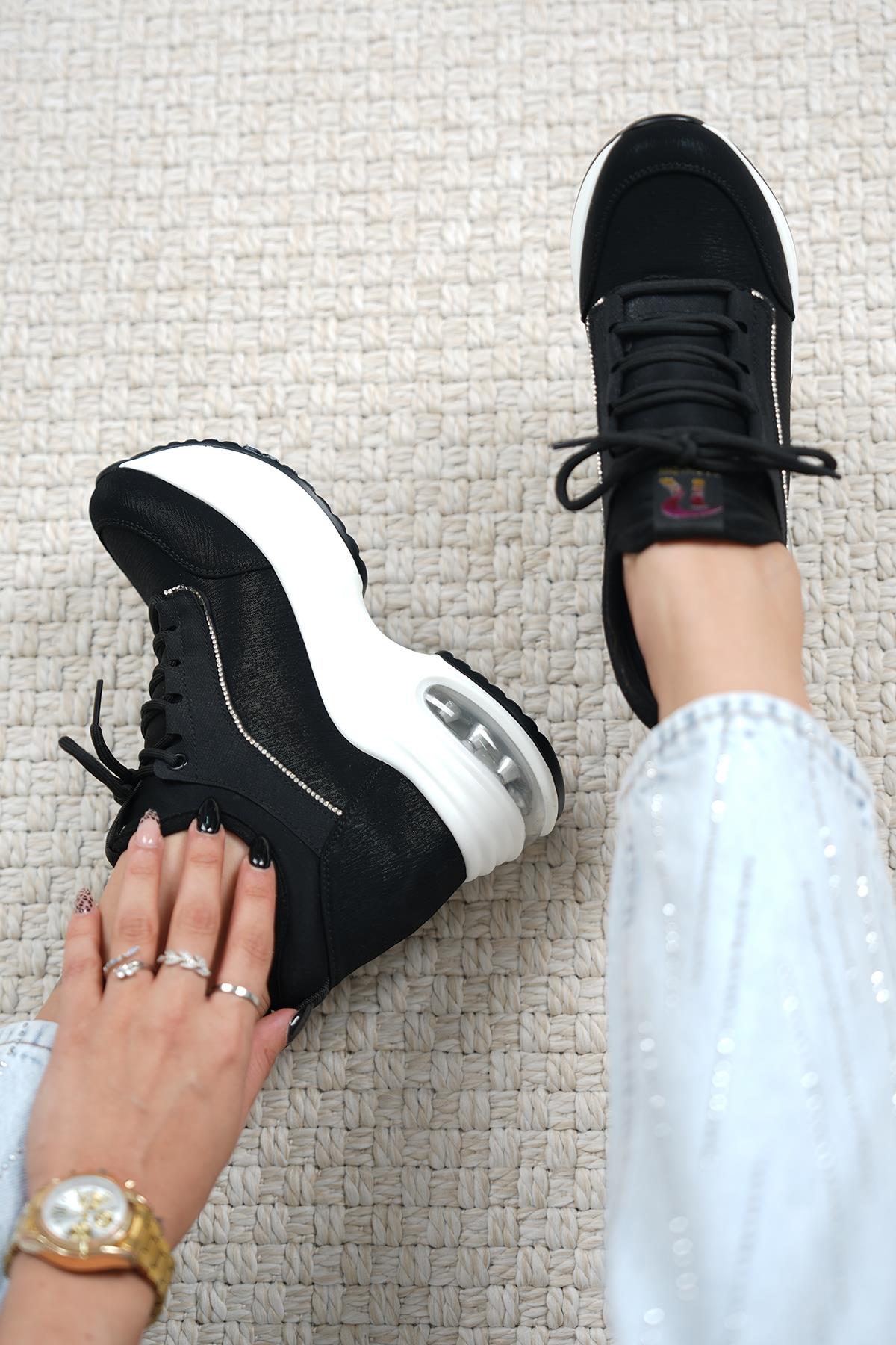 REBA ORİJİNAL GUJA İTHAL YAN TAŞ DETAYLI GİZLİ DOLGU KADIN SPOR AYAKKABI SİYAH