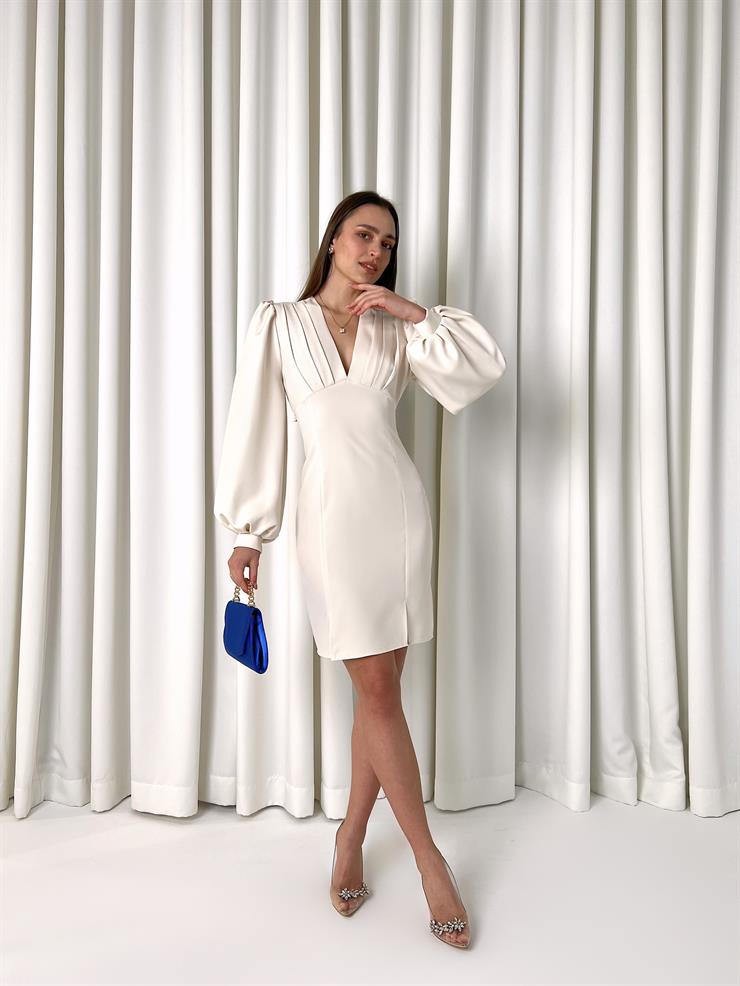 	Derin V Yaka Belden Oturtmalı Arkadan Kuşaklı Gale Kadın Bej Elbise 23K000450