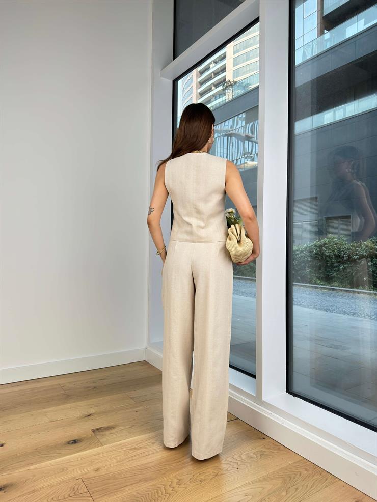 Önü Düğme Kapamalı Yelek Yüksek Bel Pens Detaylı Bol Paça Pantolo Arlan Kadın Bej Takım 24Y666