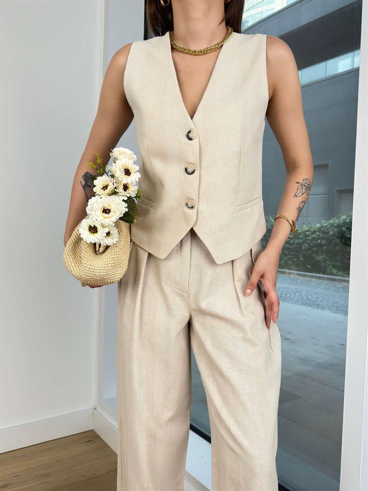 Önü Düğme Kapamalı Yelek Yüksek Bel Pens Detaylı Bol Paça Pantolo Arlan Kadın Bej Takım 24Y666