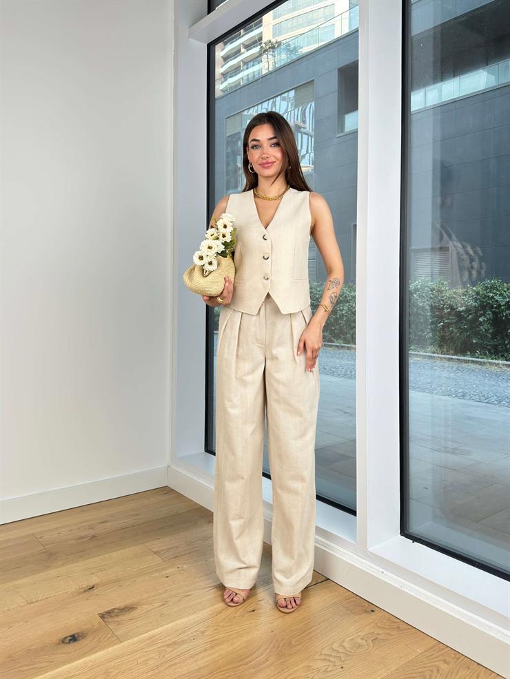 Önü Düğme Kapamalı Yelek Yüksek Bel Pens Detaylı Bol Paça Pantolo Arlan Kadın Bej Takım 24Y666