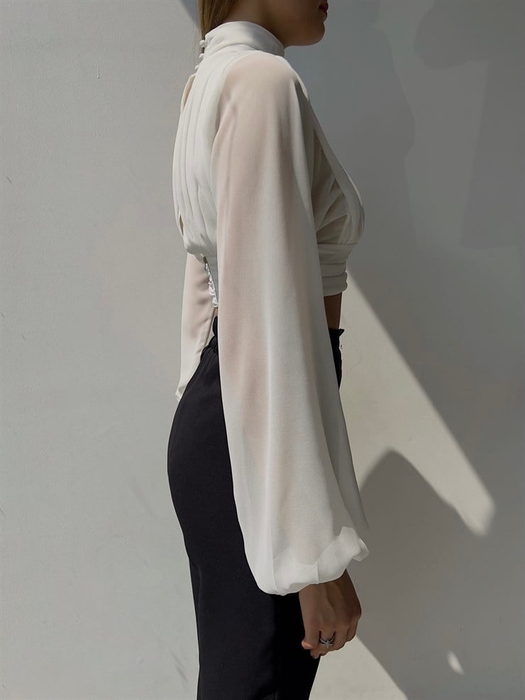 Boğazlı Drapeli Fermuar Kapamalı Sırt Dekolteli Kol Lastikli Kısa Fritzi Kadın Beyaz Bluz 23K000025