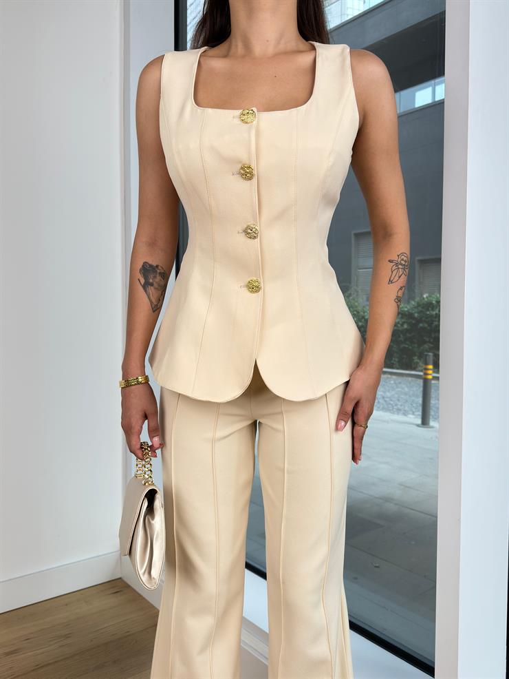 Kare Yaka Kalın Askı Görünümlü Düğmeli Yelek Yüksek Bel Ters Dikiş Detaylı İspanyol Paça Pantolon Cielo Kadın Taş Takım 25K069