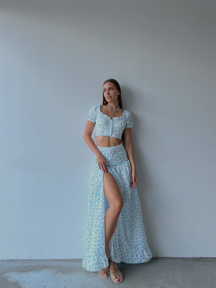 Desenli Üst Düğme Kapamalı Kol Lastikli Eteği Yırtmaçlı ve Fermuar Kapamalı Telma Kadın Mavi İkili Takım 22Y000512