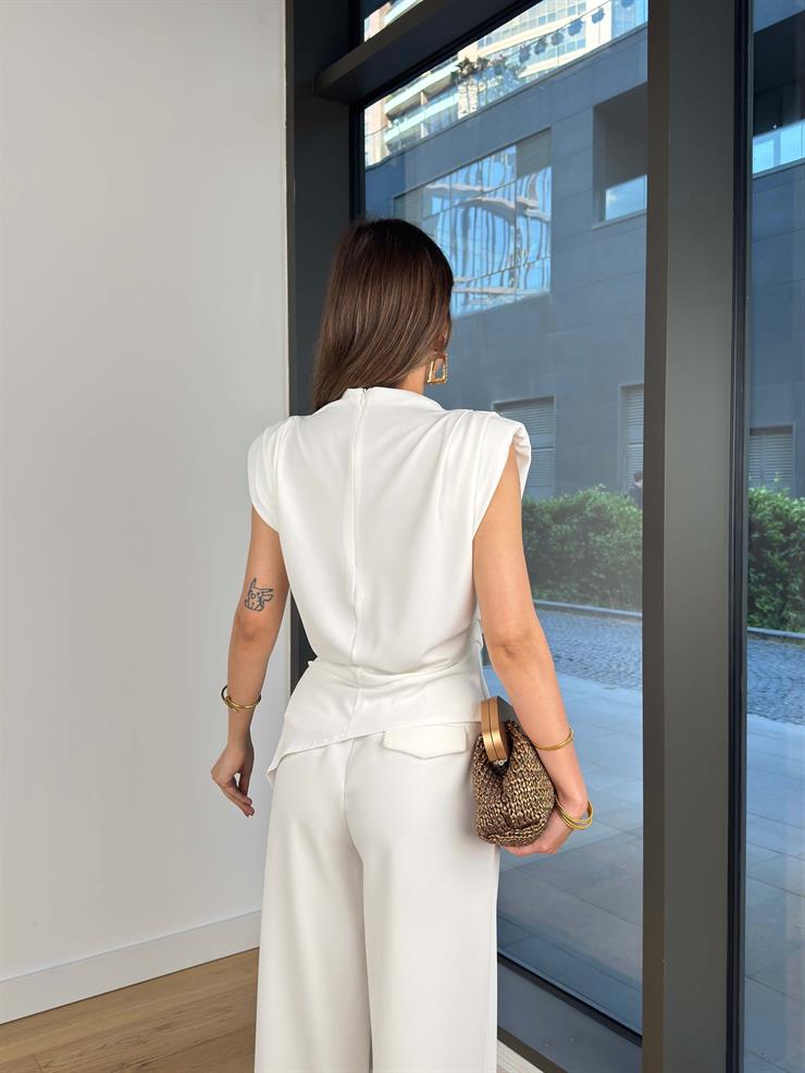 Asimetrik Kesim Halberi Ekru Kadın Bluz 25Y040