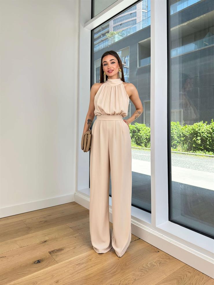 Boğazlı Kolsuz Drapeli Belden Oturtmalı Bol Paça Jiri Kadın Bej Tulum 24Y574