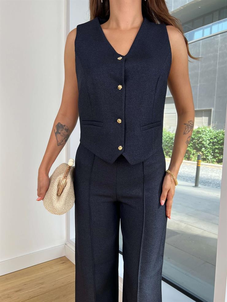 Düğme Kapamalı Yelek Yüksek Bel Ters Dikiş Detaylı Bol Paça Pantolon Josue Kadın Lacivert İkili Takım 25K067