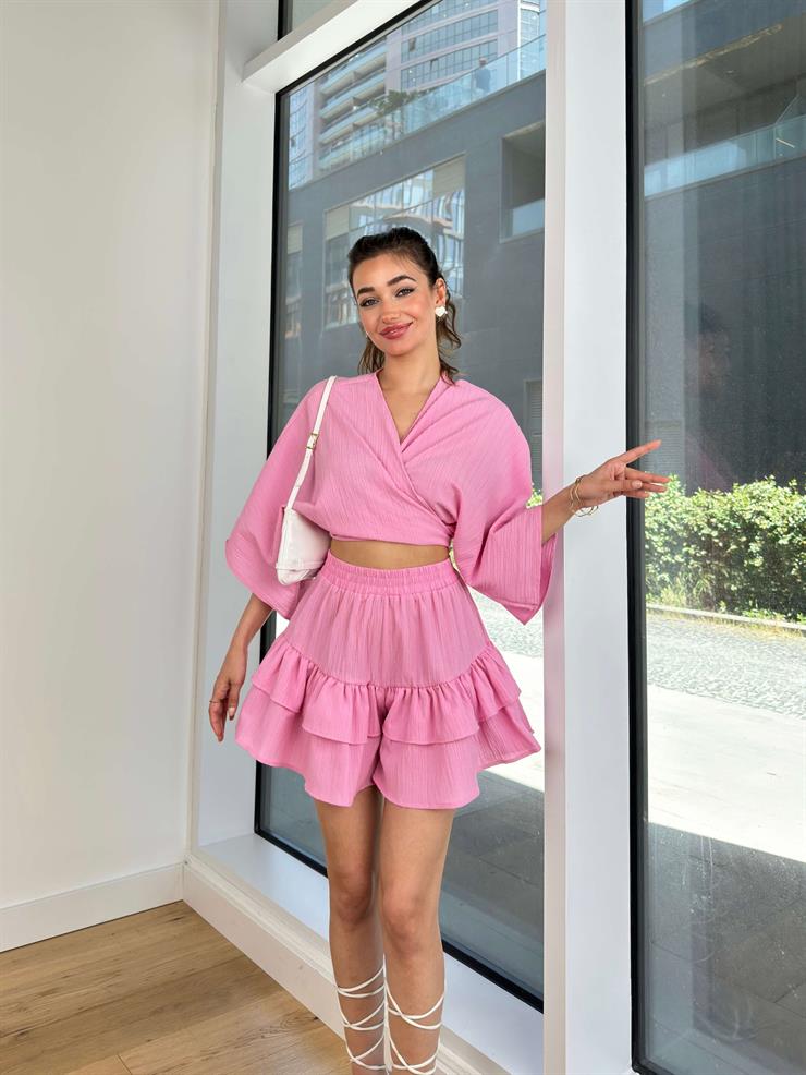 Kruvaze Yaka Belden Bağlamalı Geniş Yarım Kol Crop Yüksek Bel Mini Katlı Etek Nathan Kadın Pembe Takım 24Y661