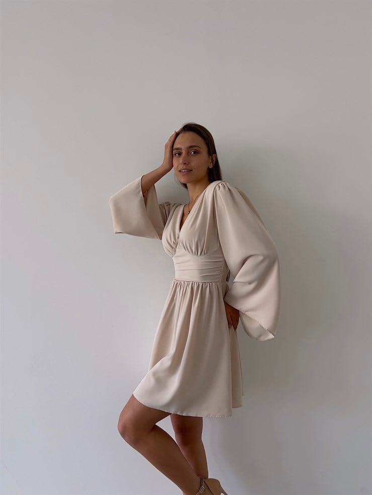 Sırtı Derin V Dekolteli Uzun Geniş Kol Belden Oturtmalı Bel Kısmı Gipeli Oskar Kadın Bej Mini Elbise 23K000036