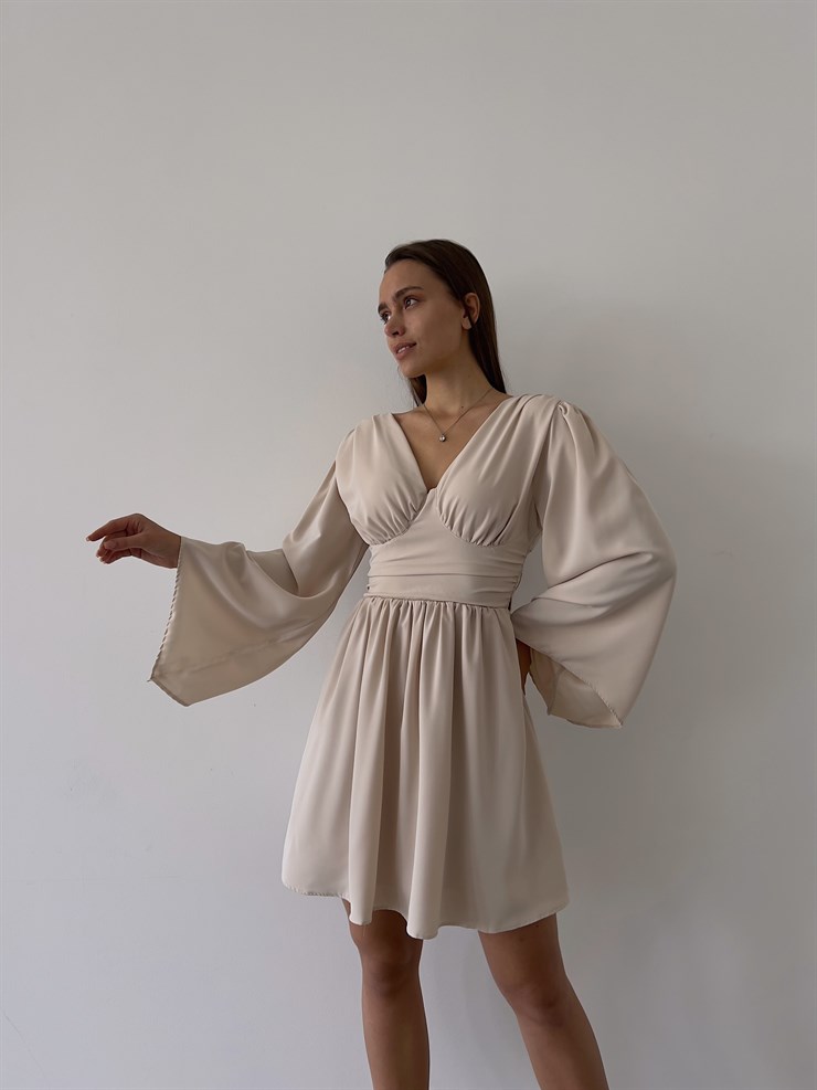 Sırtı Derin V Dekolteli Uzun Geniş Kol Belden Oturtmalı Bel Kısmı Gipeli Oskar Kadın Bej Mini Elbise 23K000036