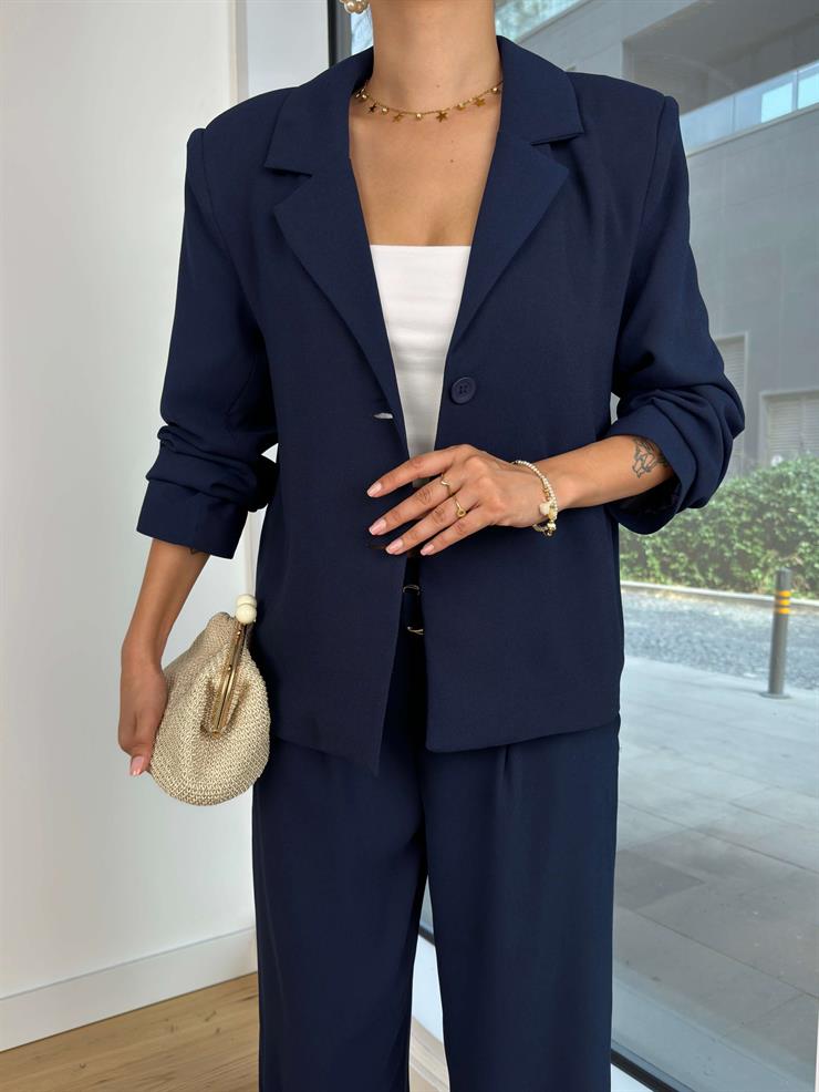 Düğme Kapamalı Blazer Ceket Yüksek Bel Kemerli Bol Paça Pantolon Yordi Kadın Lacivert Takım 25K063