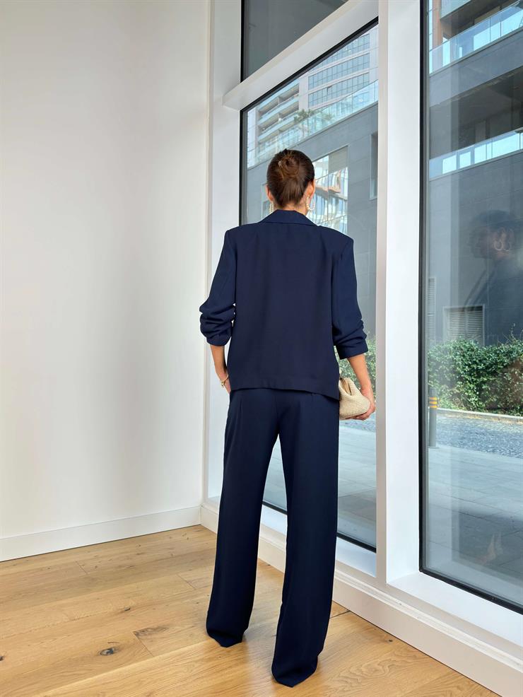 Düğme Kapamalı Blazer Ceket Yüksek Bel Kemerli Bol Paça Pantolon Yordi Kadın Lacivert Takım 25K063