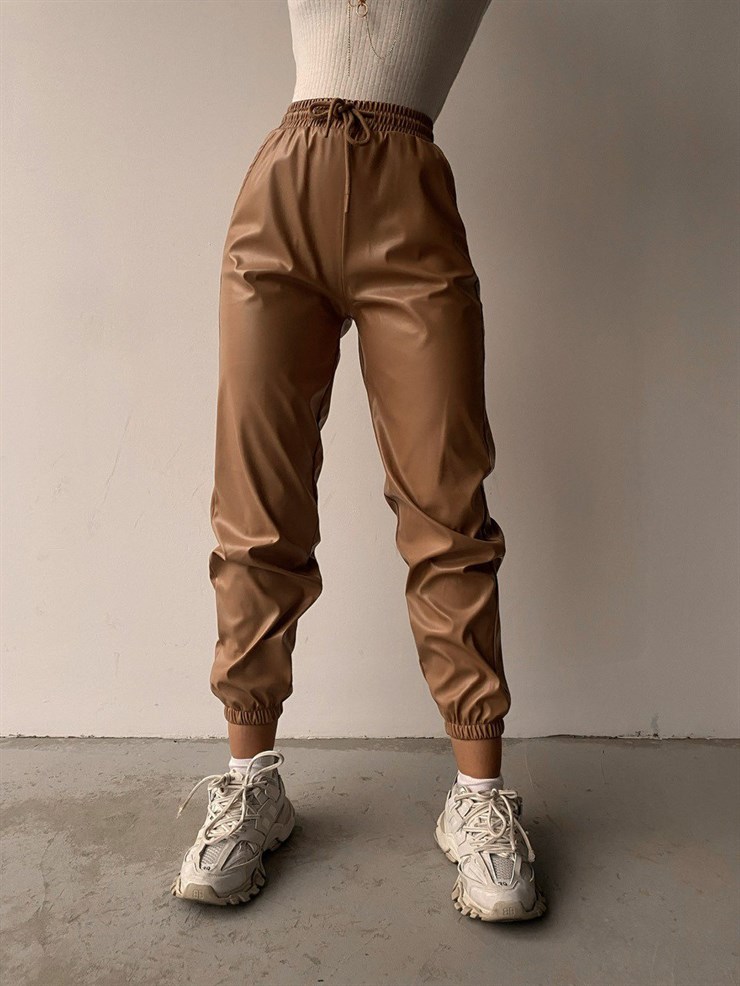 Yüksek Ve Bağcıklı Bel Paçası Lastikli Deri Kadın Fındık Pantolon 22K000028