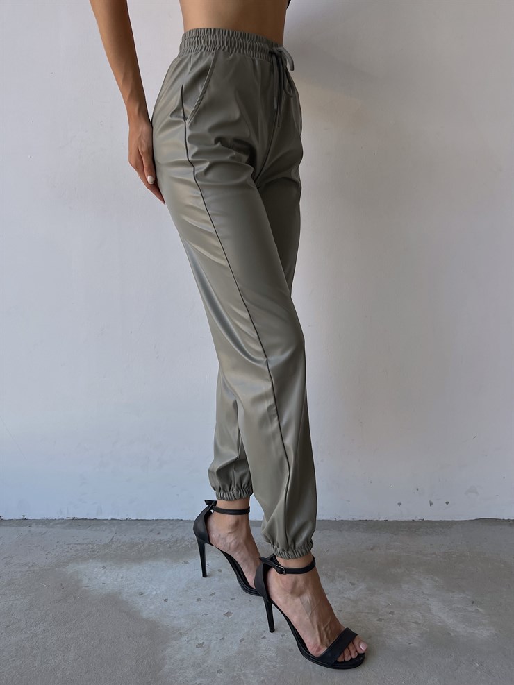 Yüksek Ve Bağcıklı Bel Paçası Lastikli Deri Kadın Çağla Pantolon 22K000028