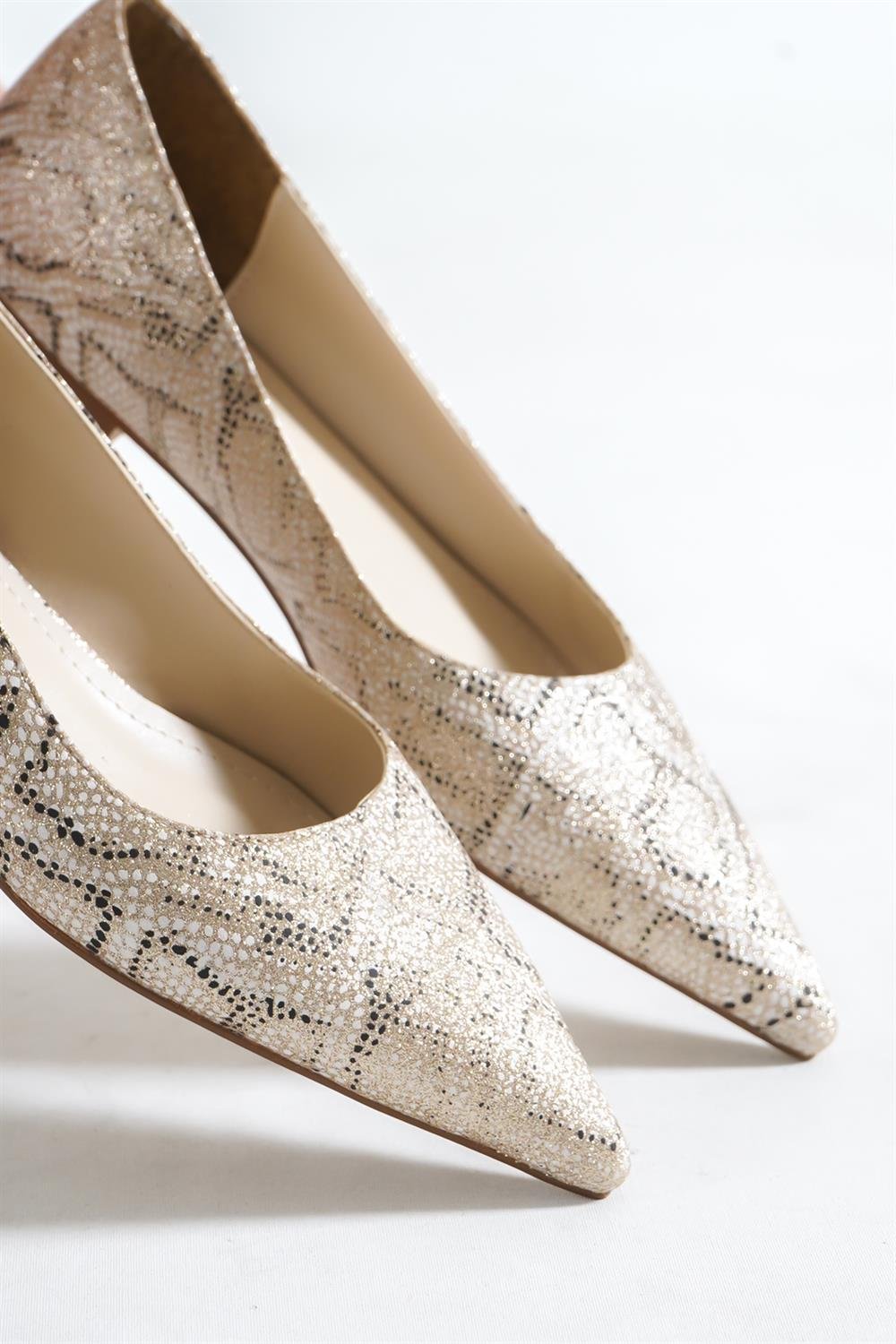 snake print pointed flats