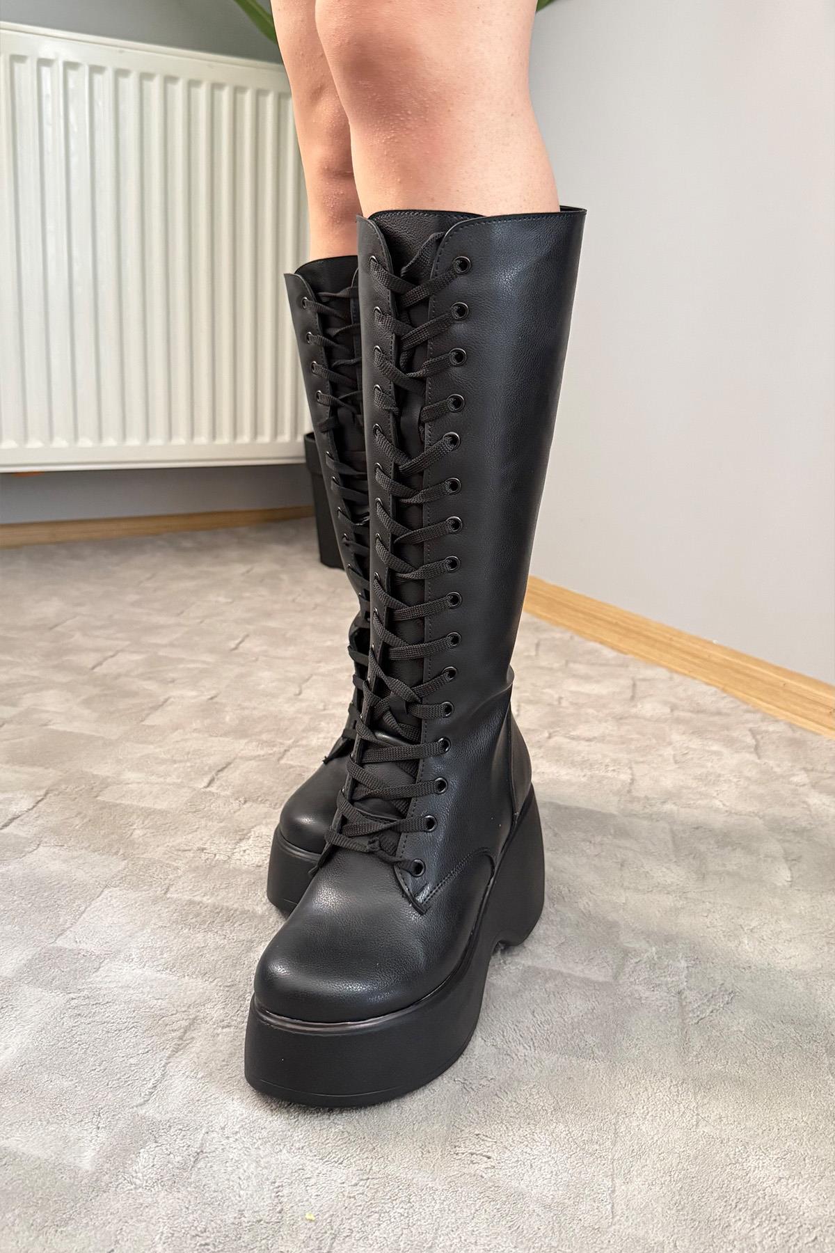 Kadın Bellina Siyah Cilt Bağcık Detaylı Fermuarlı 9 cm Topuklu Platfomlu Çizme