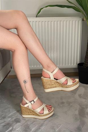 Kadın Demora Bej Cilt Çapraz Bant Dolgu Taban Ayakkabı