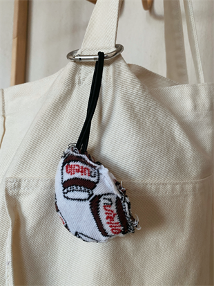 NUTELLA DESENLİ LASTİKLİ ÇANTA CHARM'I (OVAL)