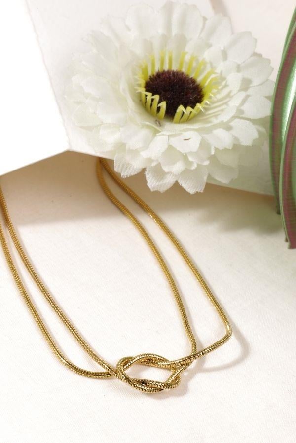 Collier noeud doré